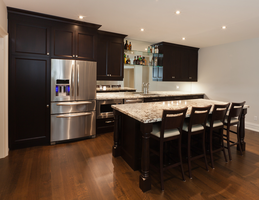 mirrored backsplash in basement kitchen